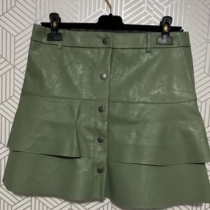 Olive skirt imitation leather, never used.